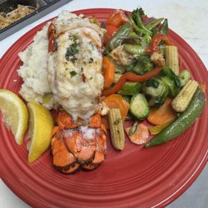 Crab imperial stuffed lobster tail at Mine Oyster. Ralph Smith photo Seafood
