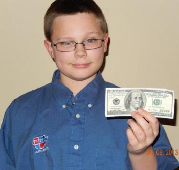 Benjamin Rumney is ready to give someone a $100 gift certificate in TDR Auto Supply's first anniversary contest. Courtesy of TDR Auto Supply